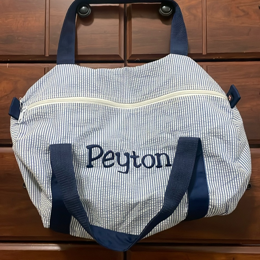 Small monogrammed duffle bag